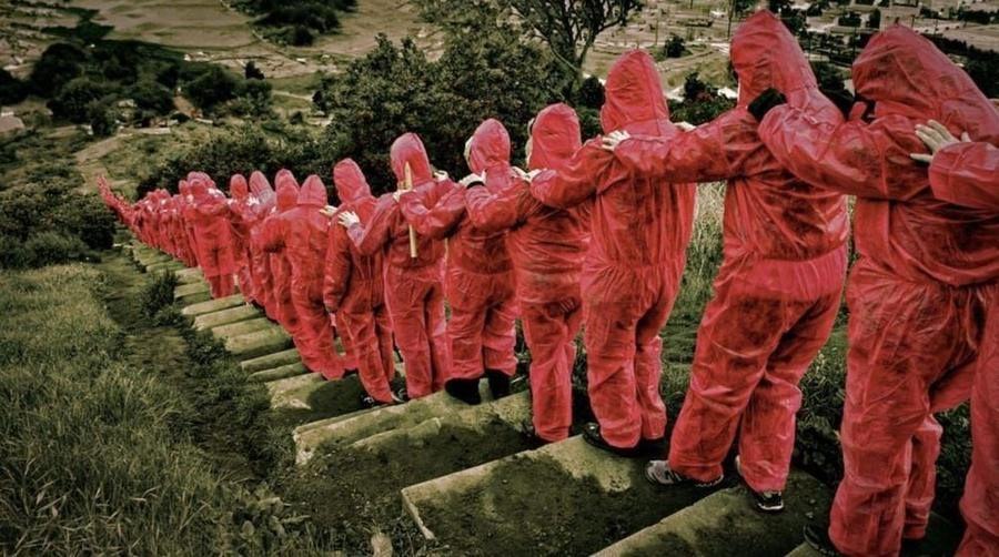 Red Men on Steps