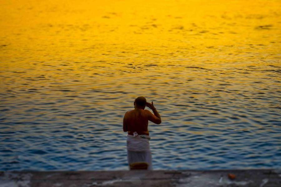 Man Bathing in the Ganges River, India